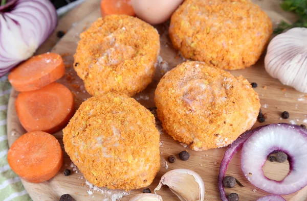 Meat patties on board on napkin close-up — Stock Photo, Image