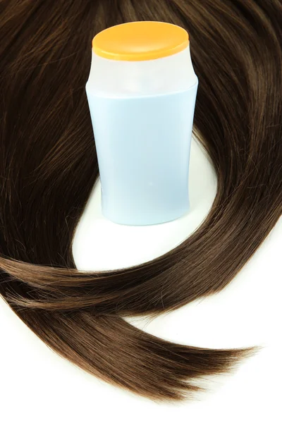 Glänsande brunt hår med schampo isolerad på vit — Stockfoto