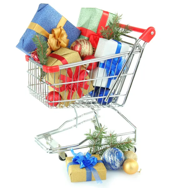 Christmas gifts in shopping trolley, isolated on white — Stock Photo, Image