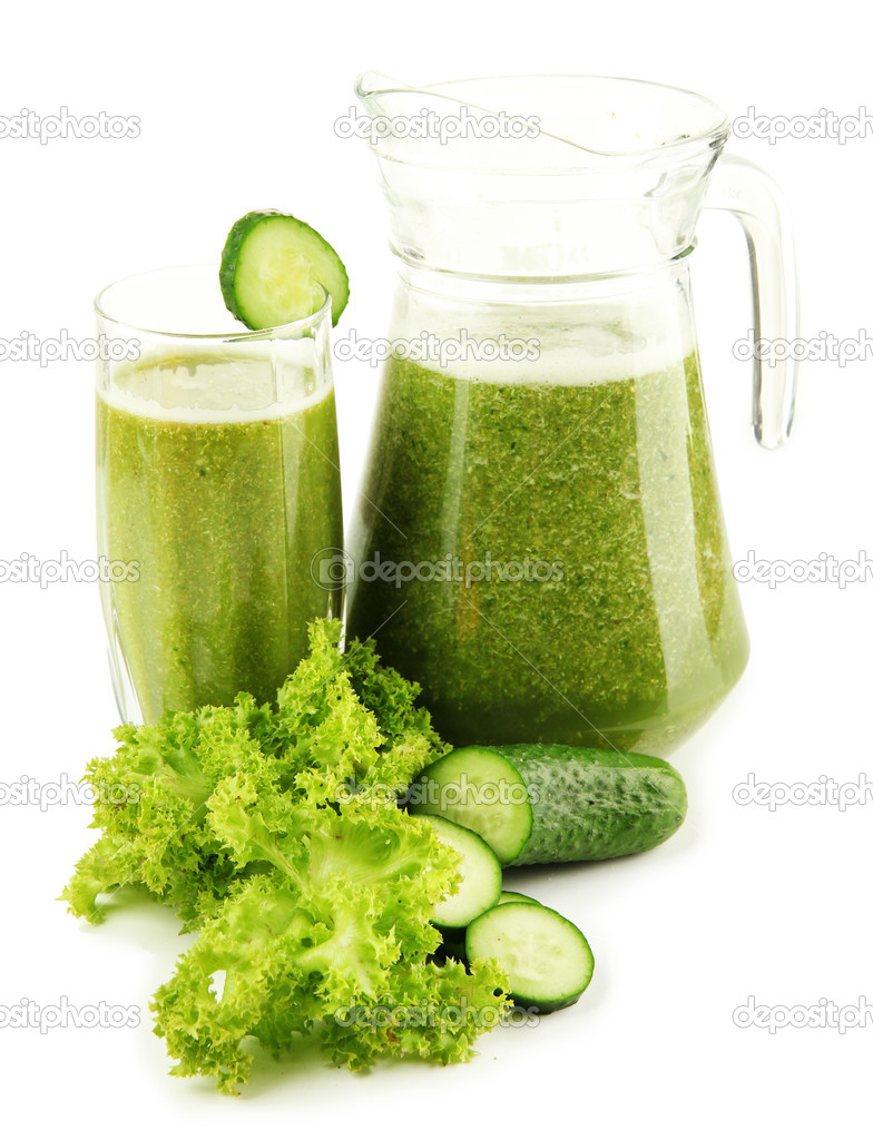 Glass and jug of green vegetable juice with cucumber isolated on white