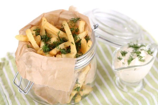 French fries in bank on napkin isolated on white — Stock Photo, Image