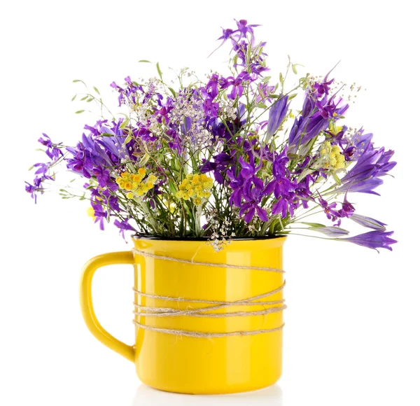 Bouquet of wildflowers in cup — Stock Photo, Image