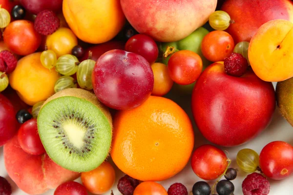 Surtido de frutas jugosas de fondo — Foto de Stock