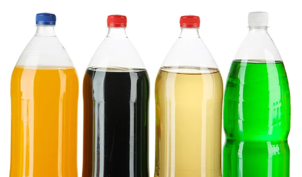 Surtido de botellas con bebidas sabrosas, aisladas en blanco —  Fotos de Stock