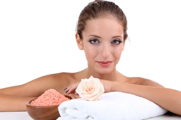 Beautiful girl with spa accessories isolated on white — Stock Photo, Image