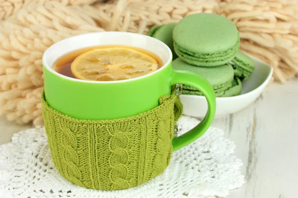 Cup with knitted thing on it close up — Stock Photo, Image