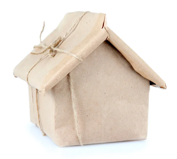 House wrapped in brown kraft paper, isolated on white — Stock Photo, Image