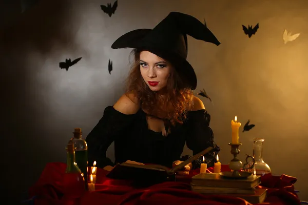 Halloween witch on dark background — Stock Photo, Image