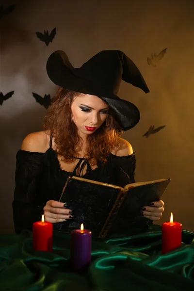 Halloween witch on dark background — Stock Photo, Image