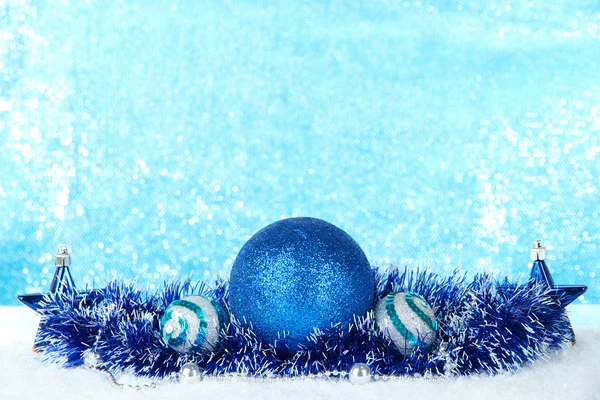 Composition of the Christmas decorations on light blue background — Stock Photo, Image