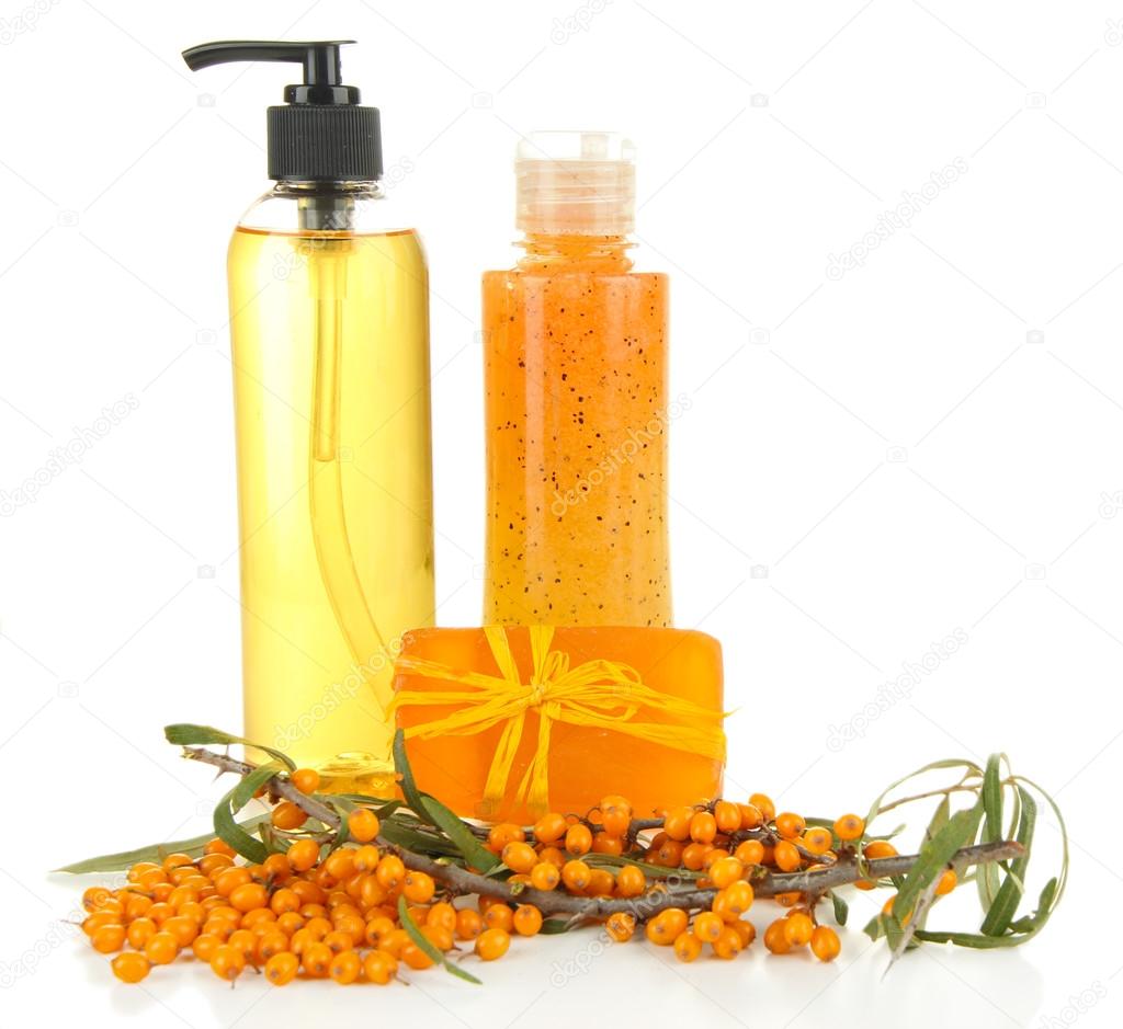 Branch of sea buckthorn with scrub and gel isolated on white