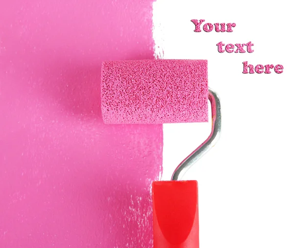 Roller brush with pink paint — Stock Photo, Image