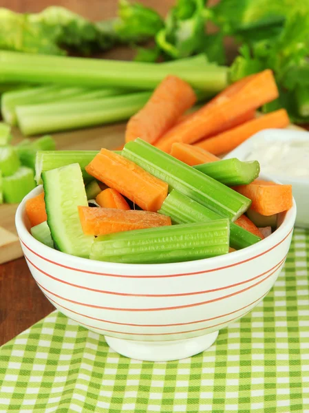 Fresh green celery with vegetables in bowl on table close-up — Stock Photo, Image