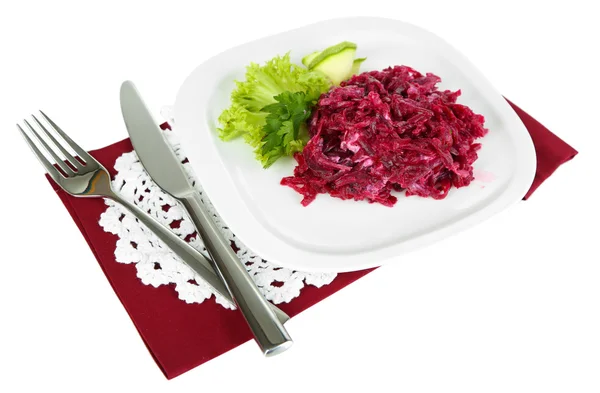 Beet salad on plate on napkins isolated on white — Stock Photo, Image