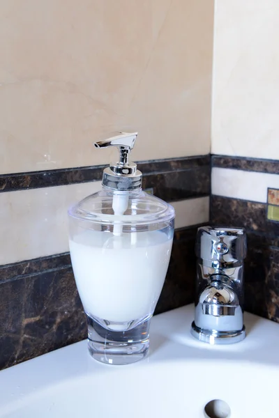 Ceramic sink with chrome fixture, close up — Stock Photo, Image