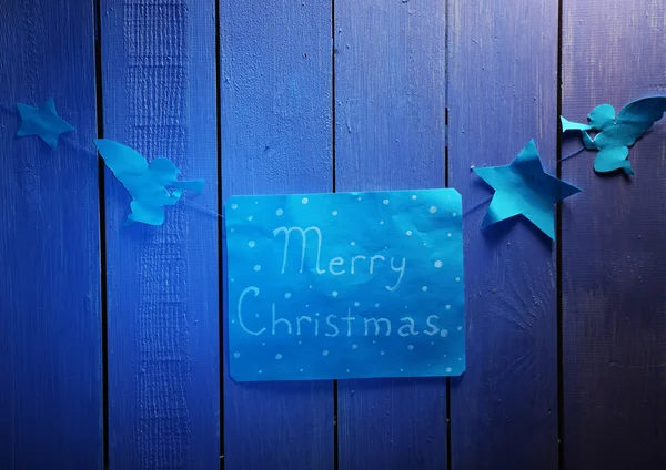 Signboard with words Merry Christmas on wooden table background close-up — Stock Photo, Image