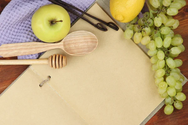 Cooking concept. Groceries with empty cookbook close up — Stock Photo, Image