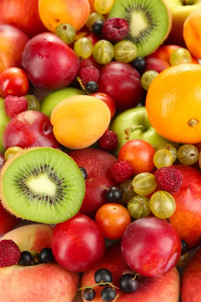 Assortment of juicy fruits background