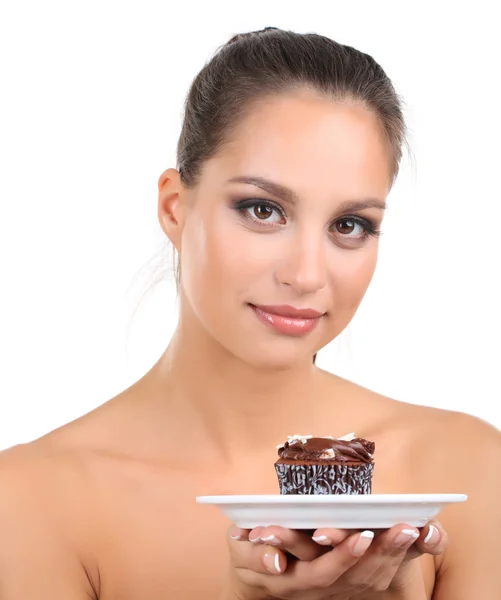 Portrait of beautiful young girl with chocolate cupcake isolated on white Stock Picture