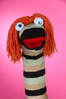 pembe bir arka plan üzerinde şirin çorap kukla