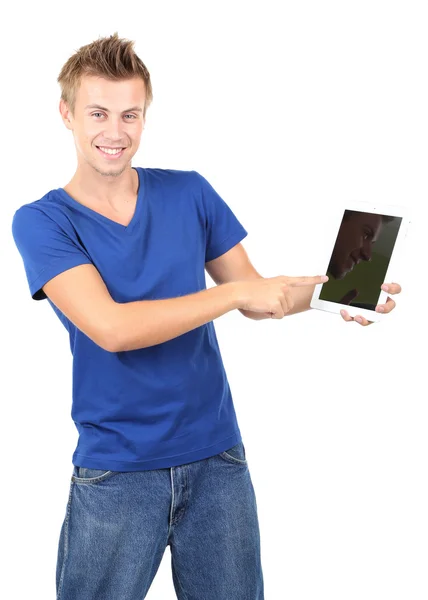 Um jovem bonito com tablet isolado em branco — Fotografia de Stock