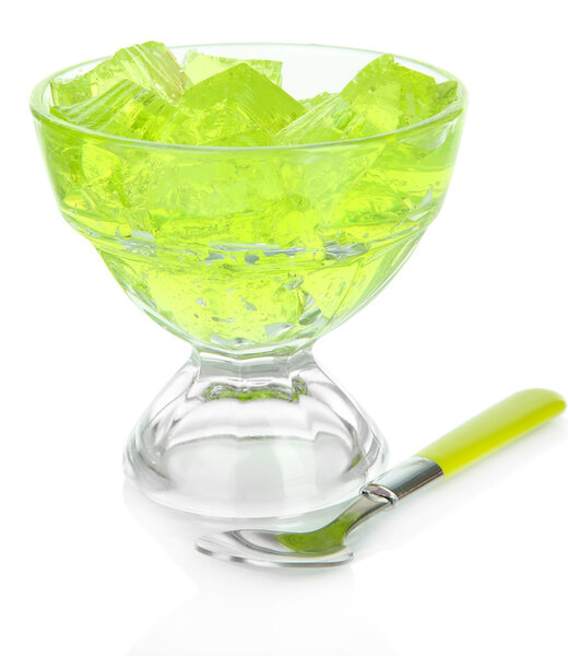 Tasty jelly cubes in bowl isolated on white