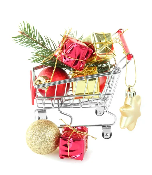 Christmas gifts in shopping trolley, isolated on white — Stock Photo, Image