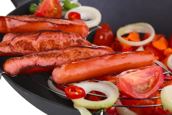 Delicious sausages in wok isolated on white — Stock Photo, Image