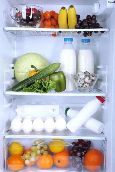 Refrigerator full of food Stock Image