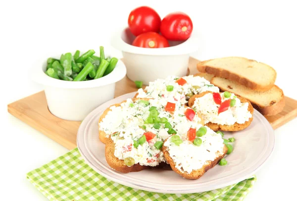 Sandwiches with cottage cheese and greens on plate isolated on white — Stock Photo, Image