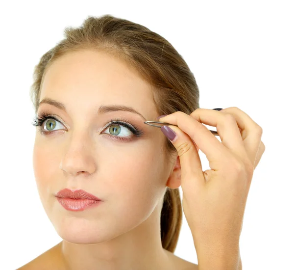 白で隔離される眉毛を摘採の若い女性 — ストック写真