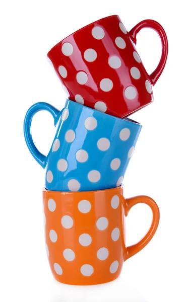 Color polka dot mugs isolated on white — Stock Photo, Image