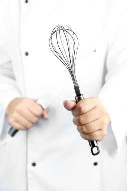 Corolla ve aşçı elinde bıçak