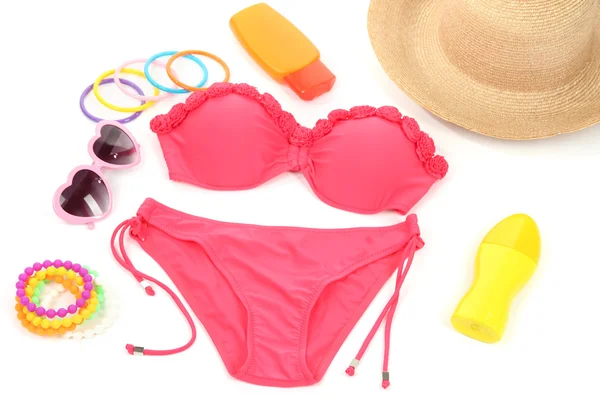 Swimsuit and beach items isolated on white — Stock Photo, Image