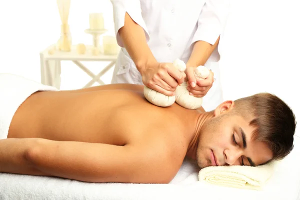 Young man having back massage close up — Stock Photo, Image