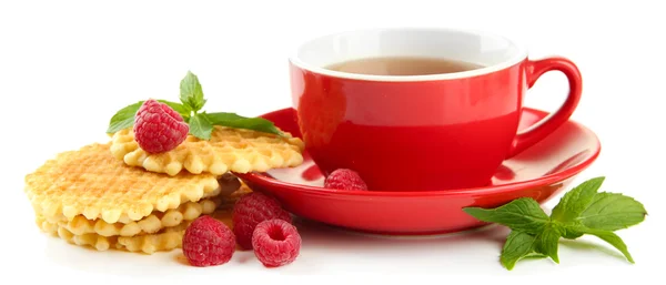 Cup of tea with cookies and raspberries isolated on white — Stock Photo, Image