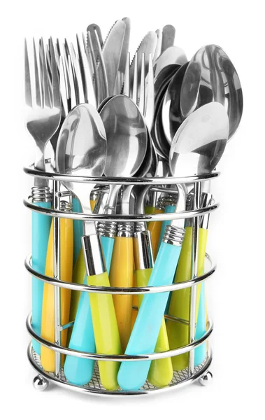 Noże, widelce i łyżki w metalowy stojak na białym tle — Zdjęcie stockowe
