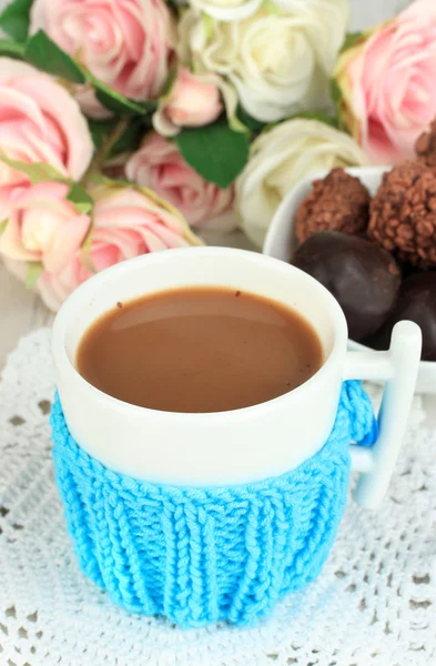 Cup with knitted thing on it close up — Stock Photo, Image