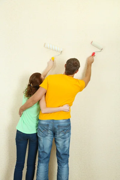 Young couple doing renovation in new house Royalty Free Stock Photos