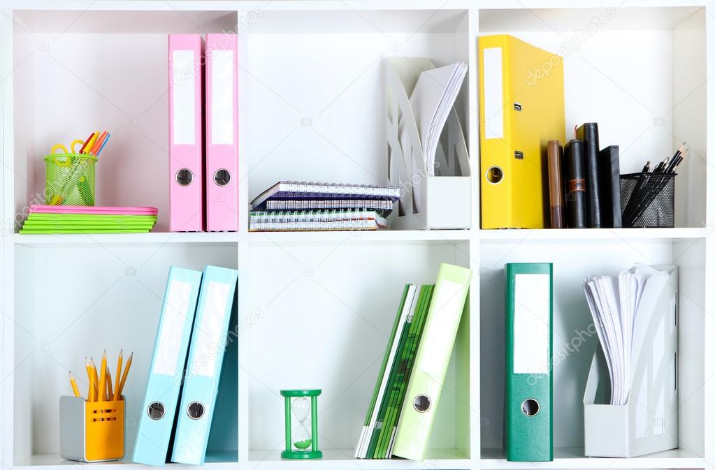 White office shelves with folders
