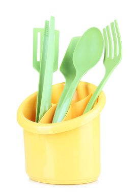 Plastik mutfak eşyaları üzerinde beyaz izole Kupası