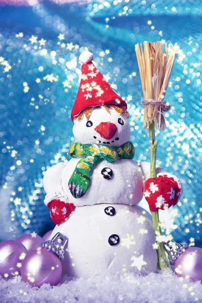 Beautiful snowman and Christmas decor, on bright background — Stock Photo, Image