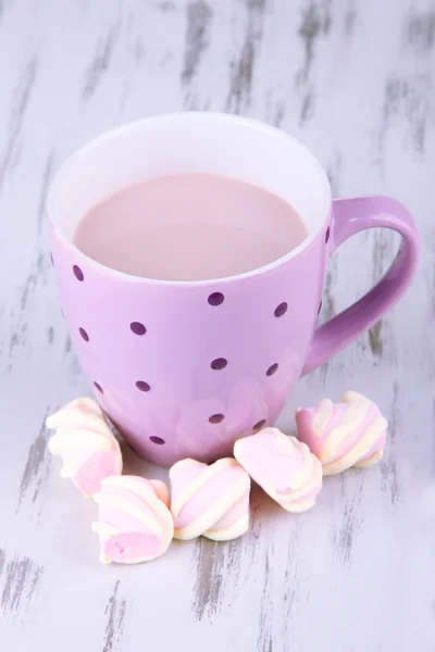 Cocoa drink on wooden background — Stock Photo, Image