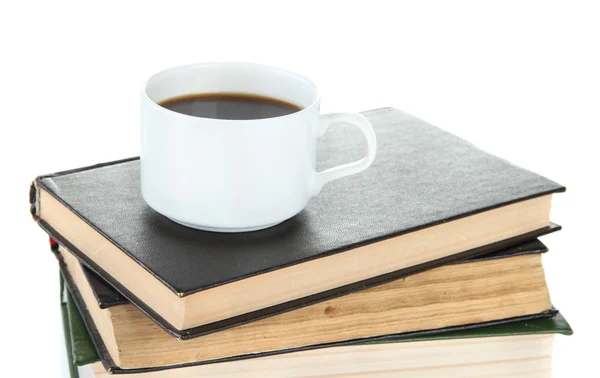 Taza de café y libros aislados en blanco — Foto de Stock