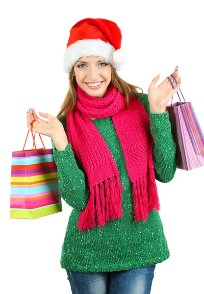 Hermosa chica sonriente con bolsas de regalo aisladas en blanco —  Fotos de Stock