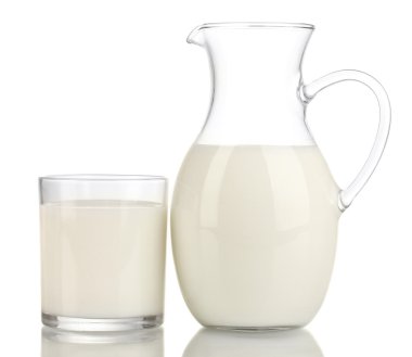 Milk in jug and glass isolated on white clipart
