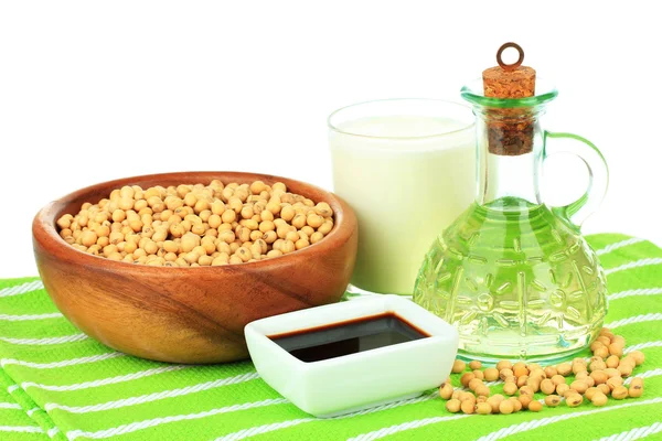 Productos de soja sobre mesa sobre fondo blanco — Foto de Stock