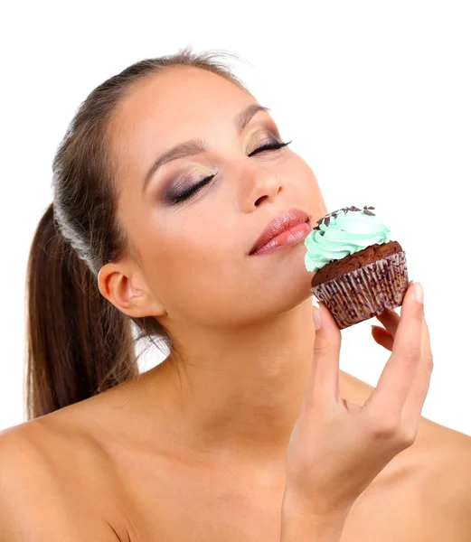 Portrait of beautiful young girl with chocolate cupcake isolated on white Royalty Free Stock Images