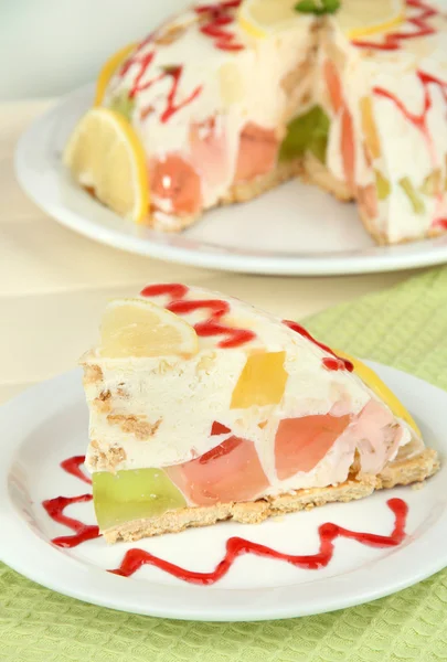 Delicious jelly cake on table on light background — Stock Photo, Image