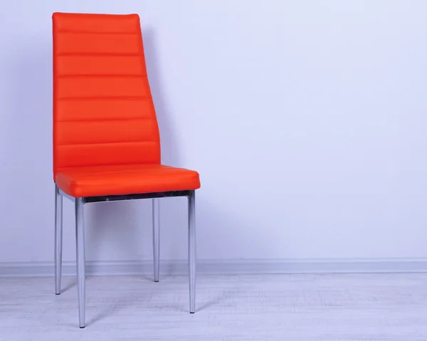 Modern color chair in empty room on wall background — Stock Photo, Image